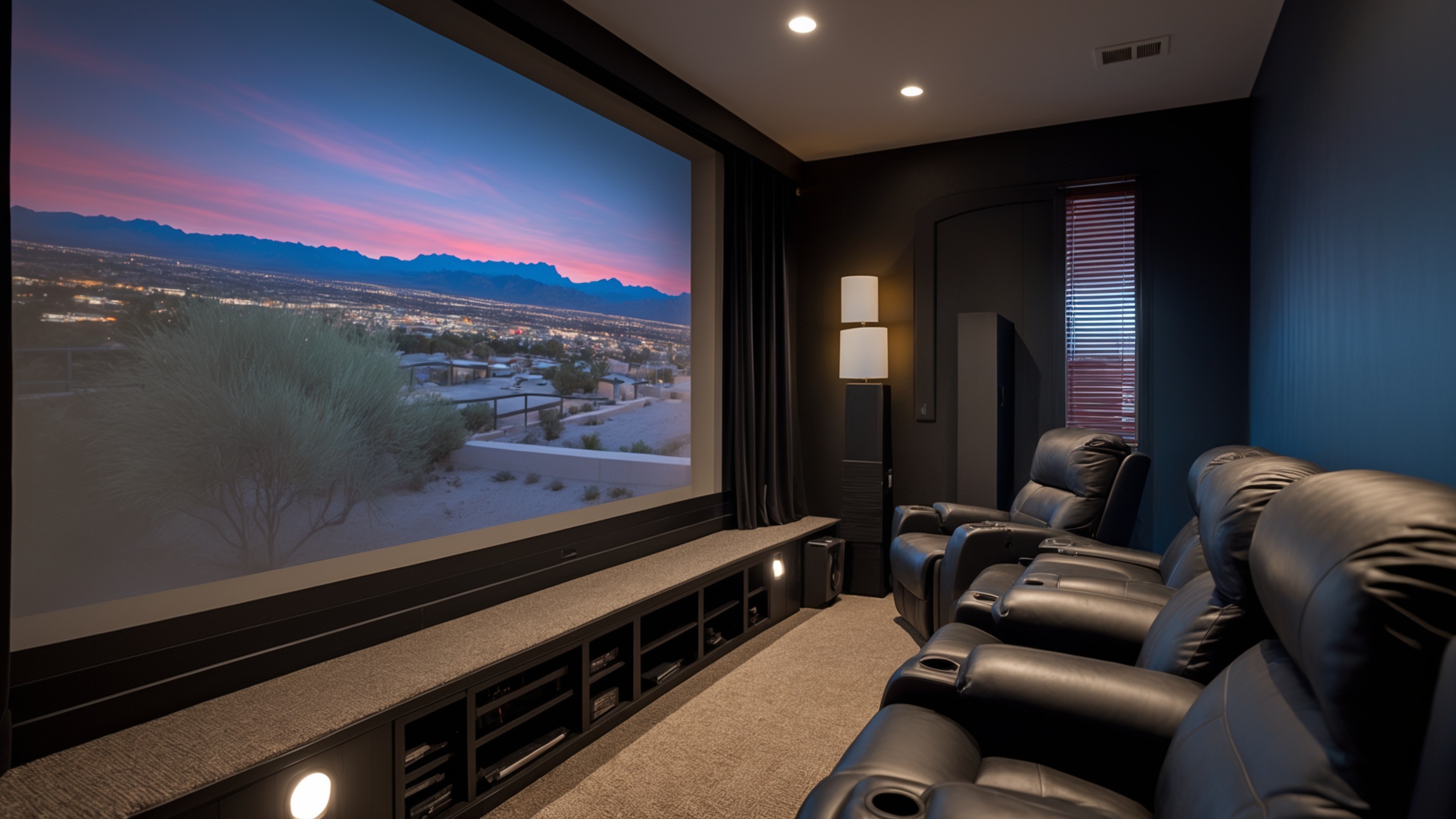 Home theater room with blackout window shades and smart lighting in Scottsdale Arizona